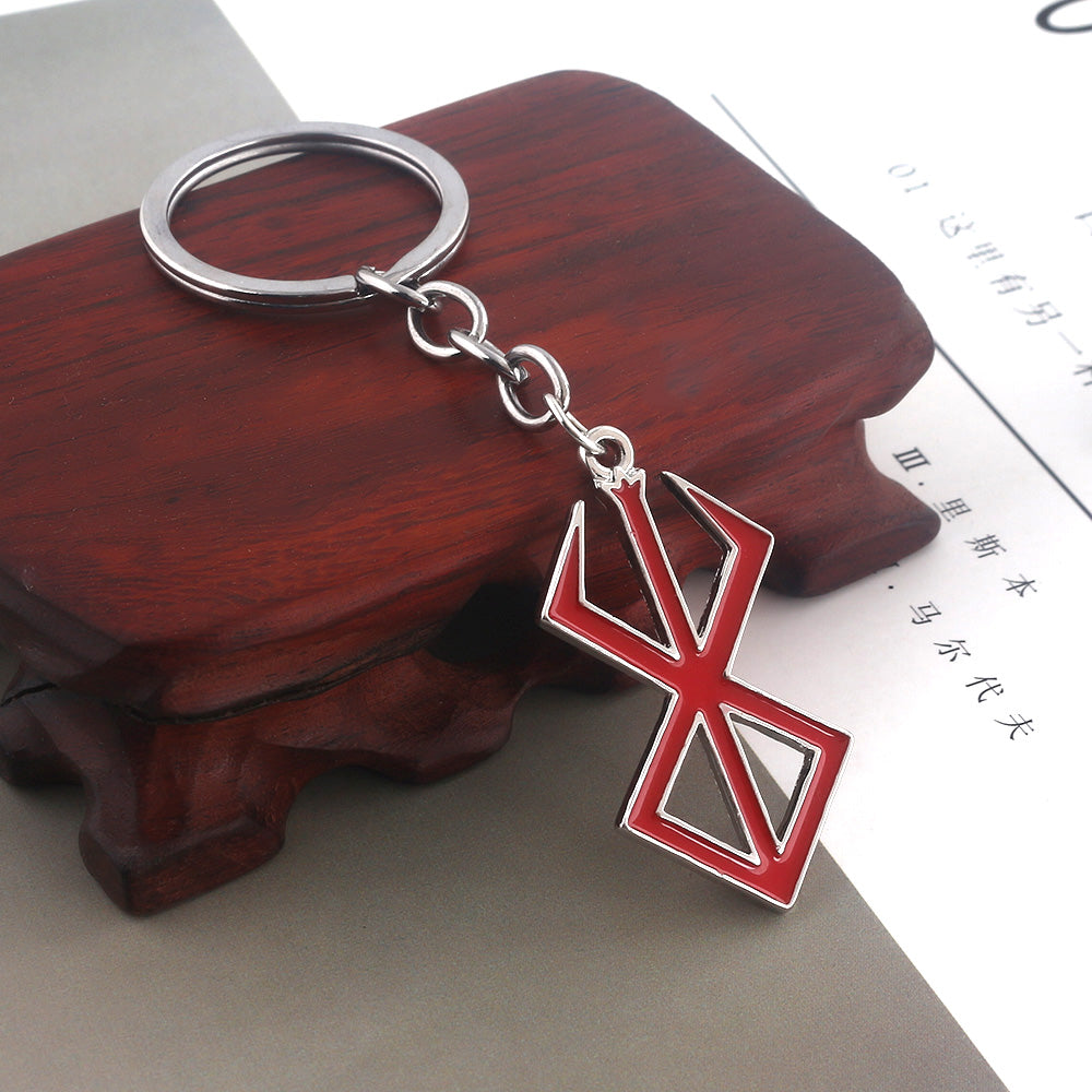 SACRIFICE / GUTS NECKLACE & KEYCHAIN (VARIOUS)